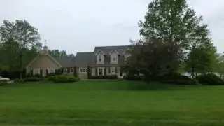 1.5 story 1.4 acres backs to private lake