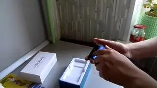 Распаковка китайского телефона Doogee DG350 с OGS экраном. Unboxing phone Doogee DG350.