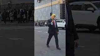 Trump Impersonator Directing Traffic on Fifth Avenue in New York City