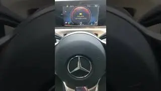 Остановите автомобиль, оставьте двигатель включенным.