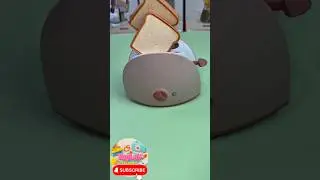 &laquo;Tiny toaster in action! Toasting mini bread slices is so cute and satisfying 🥪✨#ToyKitchen #Shorts