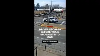 Driver jumps out of SUV moments before train crashes into it