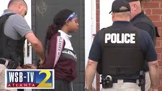Woman arrested in fraud raid: 'I don’t know what the (expletive) happened'