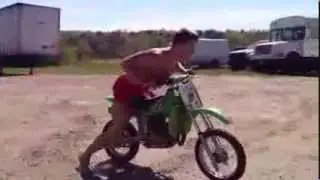 Russian starting up a motorcycle dirt bike prikol