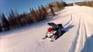 ATV's on tracks riding in deep snow ..