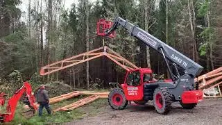 Setting parallel cord trusses on a 32' wide ICF house