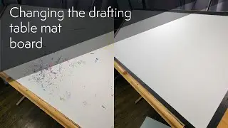 Changing out the old drafting table paper.