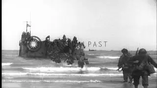 Reinforcements arriving at  Normandy beachhead during invasion of France in World...HD Stock Footage
