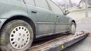 1993 Honda Accord lx. Getting it off the Rollback.
