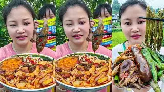 Rural Home Cooked Meal With Snail Powder Noodle Soup And Stir-Fried Sausage With Pickled Peppers