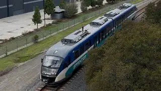 NCTS 4002 flies through the Las Flores Drive overpass on Christmas Eve 2025.