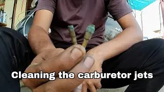 Cleaning the carburetor jets #enginexyz #carburetor #mechanic #smart 