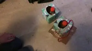Double Bottle Flip into two boxes.