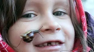 Snail Slime on Face - Little Girl an her Snail -- Funny Kids Video with Animal