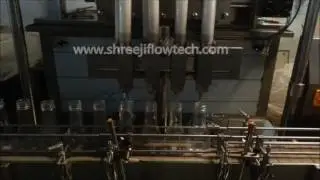 4 HEAD SERVO BASED PISTON FILLING MACHINE - Shreeji Flowtech Systems