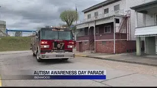 Local children with Autism take a ride in some firetrucks in Benwood