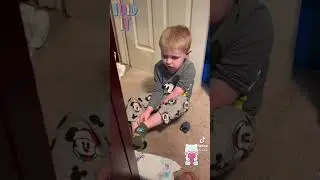 Born with one hand, putting his socks on at 3 years old.