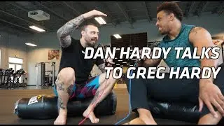 Dan Hardy talks To Greg Hardy whilst visiting American Top Team