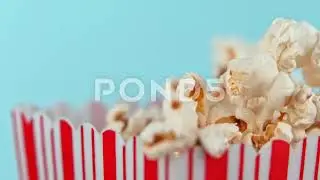 Falling popcorn in super slow motion. Shooted with high speed cinema camera at 1000fps 4K.