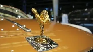Rolls Royce Ghost with golden Spirit of Ecstasy