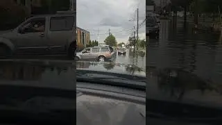 Heavy rain rescue: truck driving through flooded streets #shorts #rescue #flood