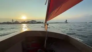 Sailing a small boat by Nantucket Light