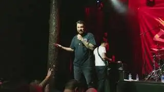 Tommy Green speaking at Sleeping Giant's final Texas show