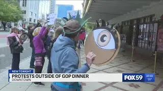 Demonstrators gather outside Indiana GOP Fall Dinner