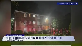 Firefighters rescue people trapped during fire