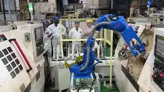ROBOTIC CNC TENDING AUTOMATION BY YASKAWA GP12 - MACHINE TENDING ROBOT
