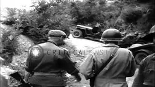General Hobart R Gay shows Brigadier Coad situation maps at the 5th Cavalry Regim...HD Stock Footage