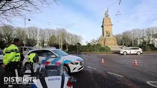 Undercover politievoertuig komt in botsing met personenauto Plein 1813 Den Haag