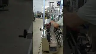 Автоматическая машина для наполнения и укупорки бутылок с маслом