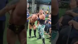 Alex Van Zant runs Jason Hotch into the wrestling ring corner post