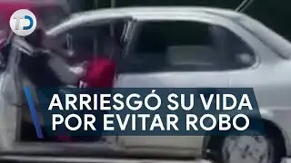 Mujer arriesgó su vida; se colgó de la puerta de su auto para evitar robo