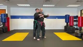 Rear bear hug -  arms free
