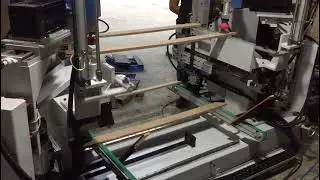 Automatic machine for wood product - double end mitre sawing