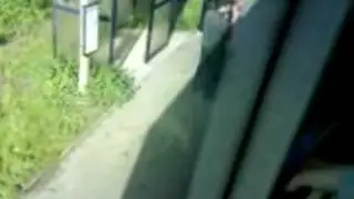 People Boarding a Bus