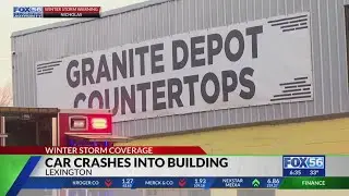 Car slides on ice into Lexington building near distillery district, police say
