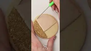 I made leopard print cookies with royal icing and gold sprinkles