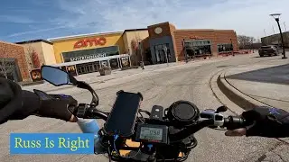 EBike Riding Around An Outdoor Shopping Center