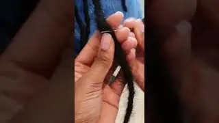 Removing frizz/loose hair on a dreadlock using a crochet hook #dreadlocks #dreads #locs #hair