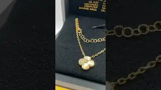 VCA inspired necklace. 18K gold, 6.26g. Has Adjustable length that varies between 16.5-18 inches.