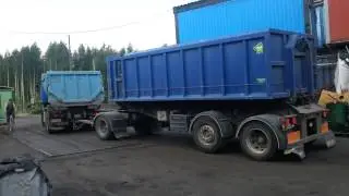 Rigid truck with trailer reversing
