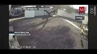(DIFFERENT ANGLE) Ferromex Train Hits Tanker Truck In Mexico 