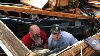 Dog rescued from tornado-damaged home in Alabama