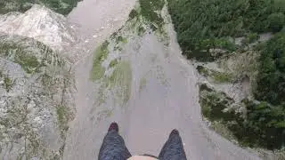 Base jump cliff strike