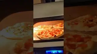 Gozney Dome Gen 2 XL cooking 3 x 12inch pizzas at once