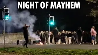 Thugs burn cars, hurl fireworks at cops & set up BARRICADES during &lsquo;warzone&rsquo; night of violence