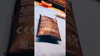 Russian guy stabs a phone battery